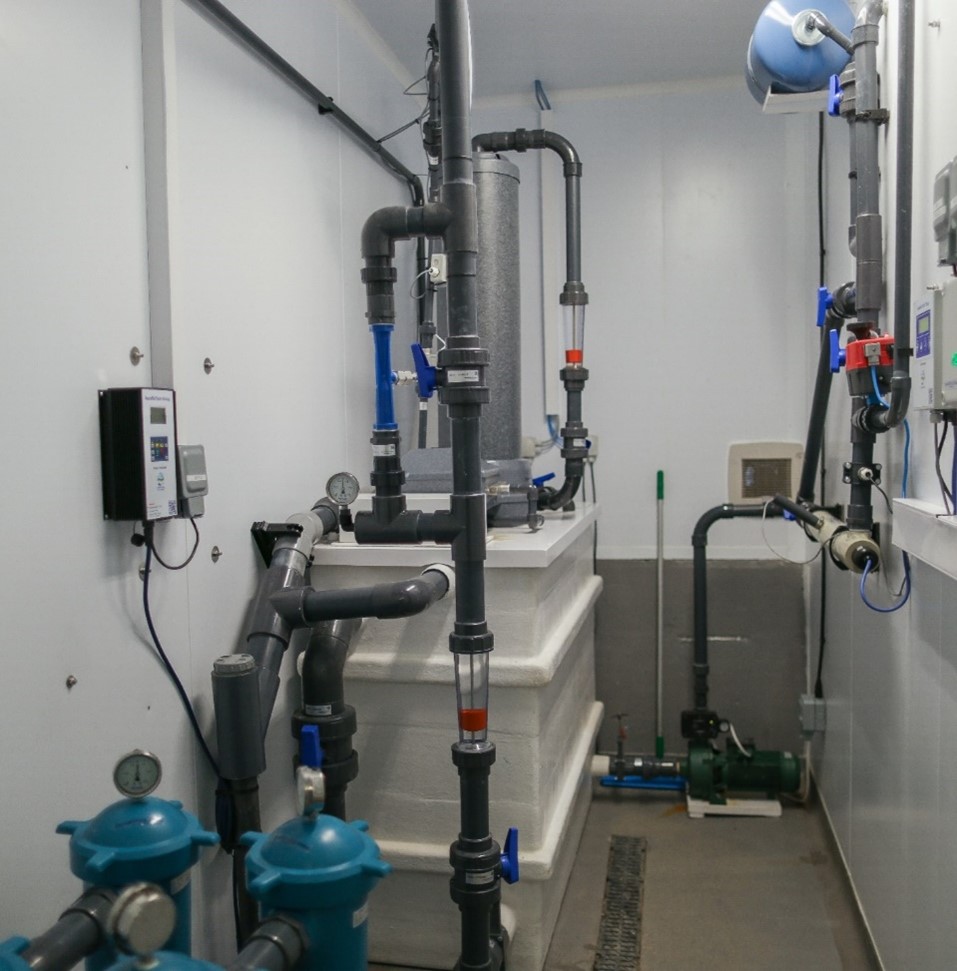 Photograph of the NBFRU intake water treatment room with filters and monitoring equipment